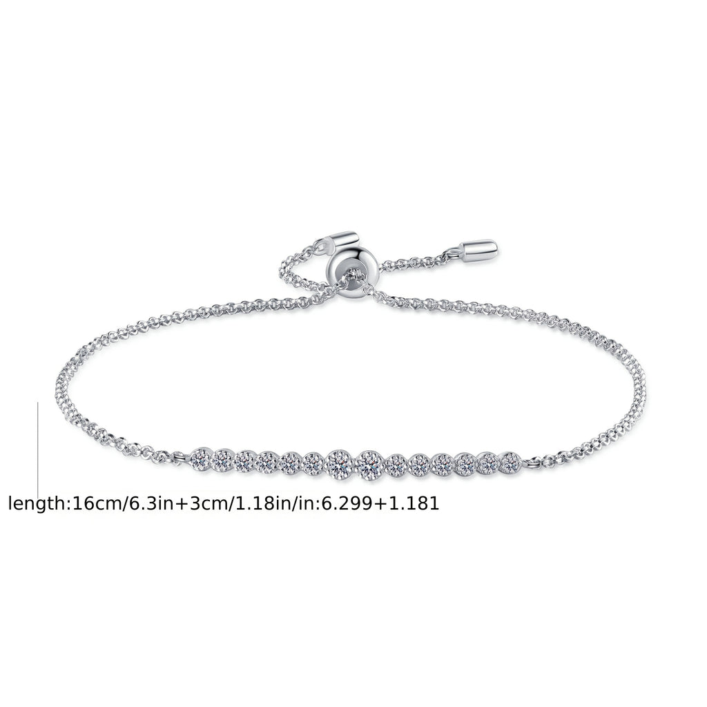 The Design of The S925 Sterling Silver Single-Row Synthetic Zirconia Bracelet for Women Conveys a Sense of Elegance And Versatility, Featuring a Pull-Adjustable Design.